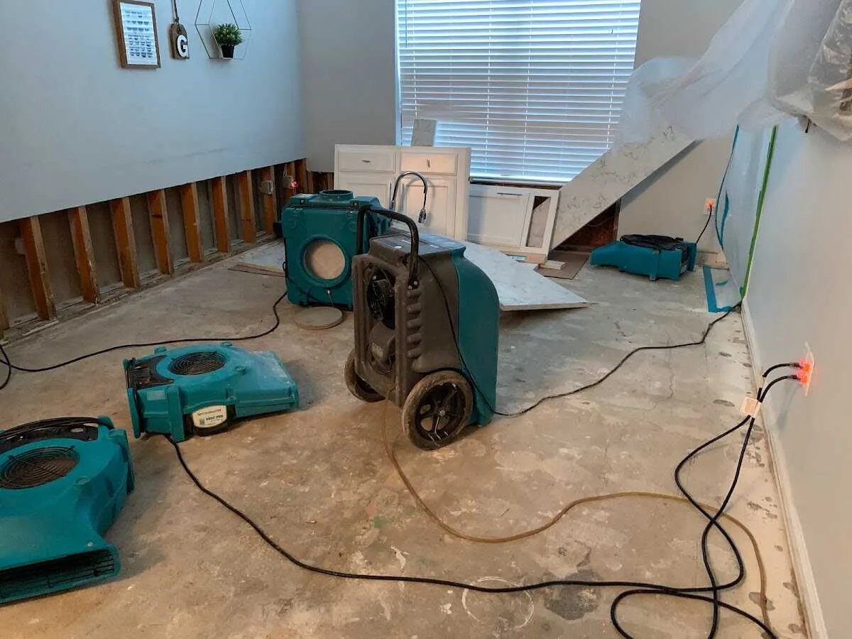 Dehumidifier in flood-cut room for Water Damage Restoration in Munster